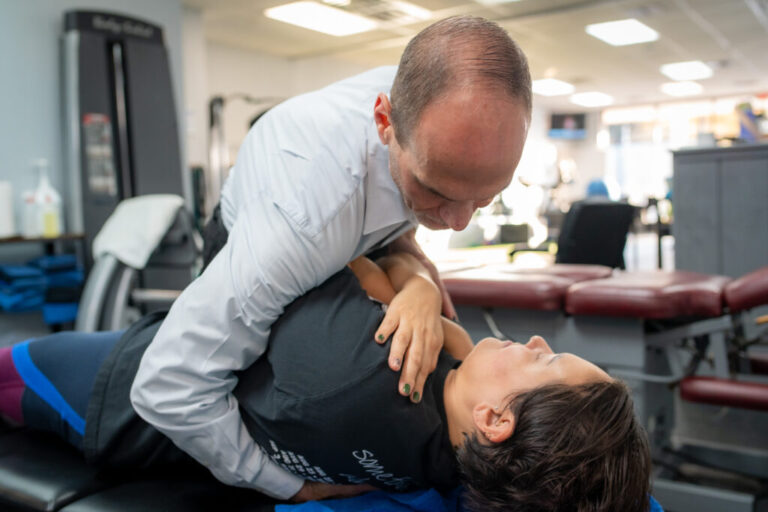 image of a chiropractor working with a patient in woodbridge nj