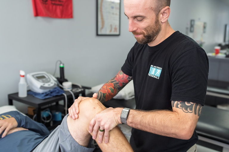 image of a physical therapist working with a patient in woodbridge nj